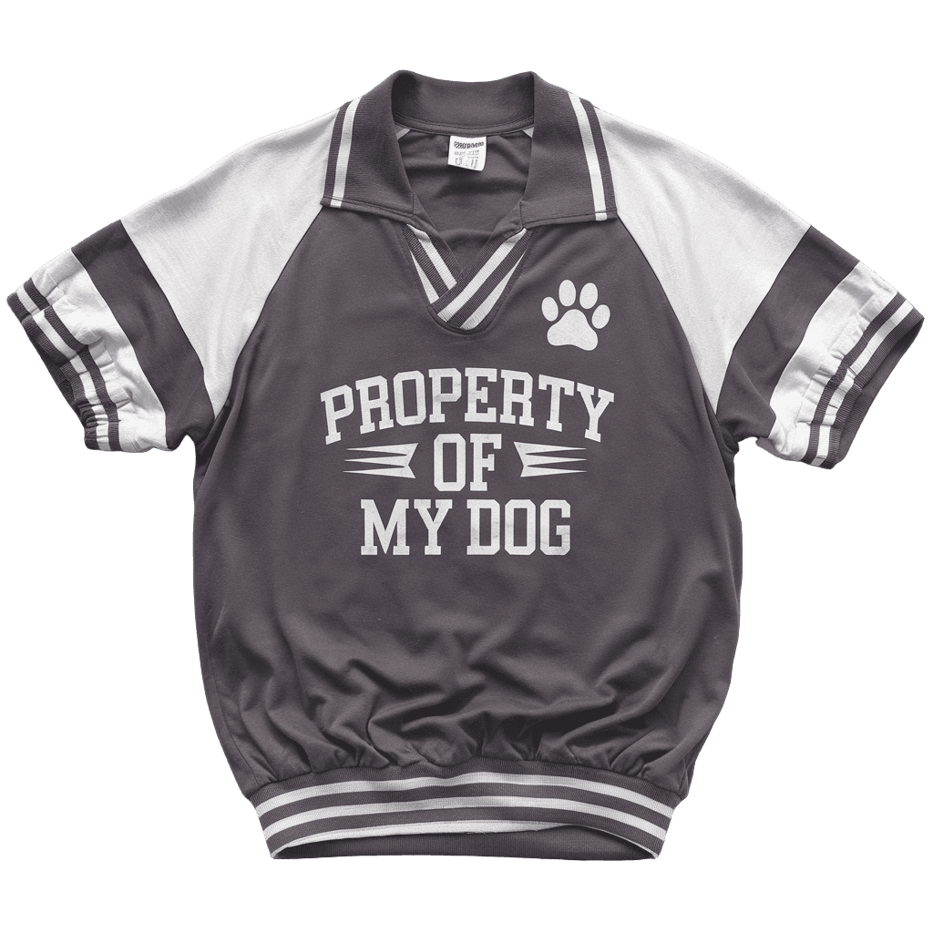 retro athletic style reading "PROPERTY OF MY DOG" with paw print logo, sporty design, on black background